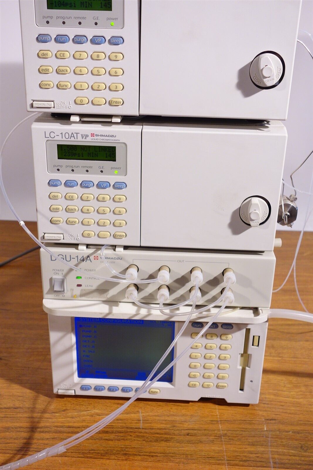 Shimadzu HPLC System (2) LC-10AT DGU-14A SCL-10A 